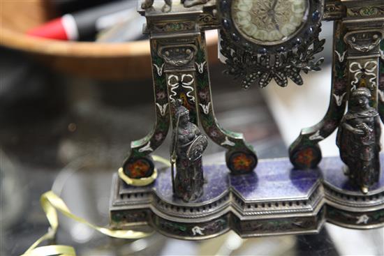 A good late 19th/early 20th century Austro-Hungarian silver gilt, polychrome enamel, lapis lazuli and gem set mantel timepiece.